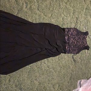 Black halter neck maxi dress with tan designs